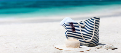 What Every Respectable Beach Bag Needs This Summer